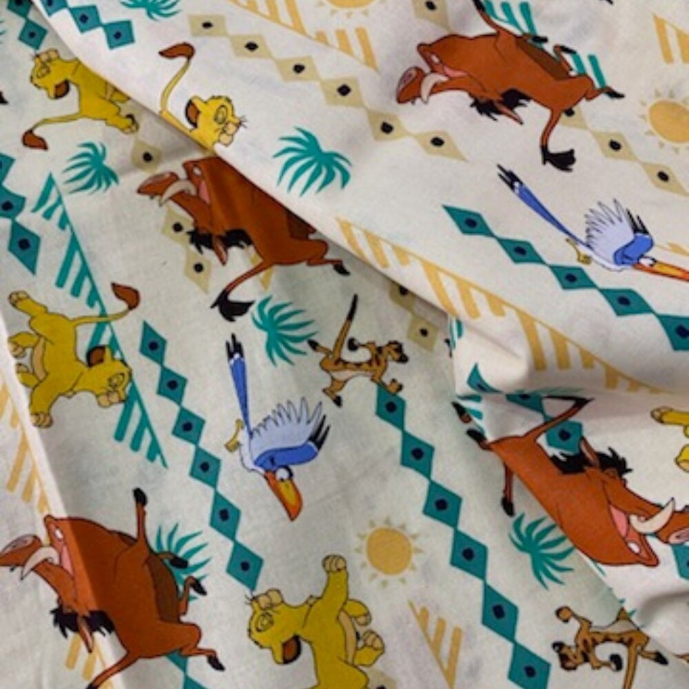 DISNEY for Springs Creative Simba Geo Prints Lion King Cotton Fabric By the Yard